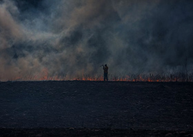 Maintaining line at prairie fire.