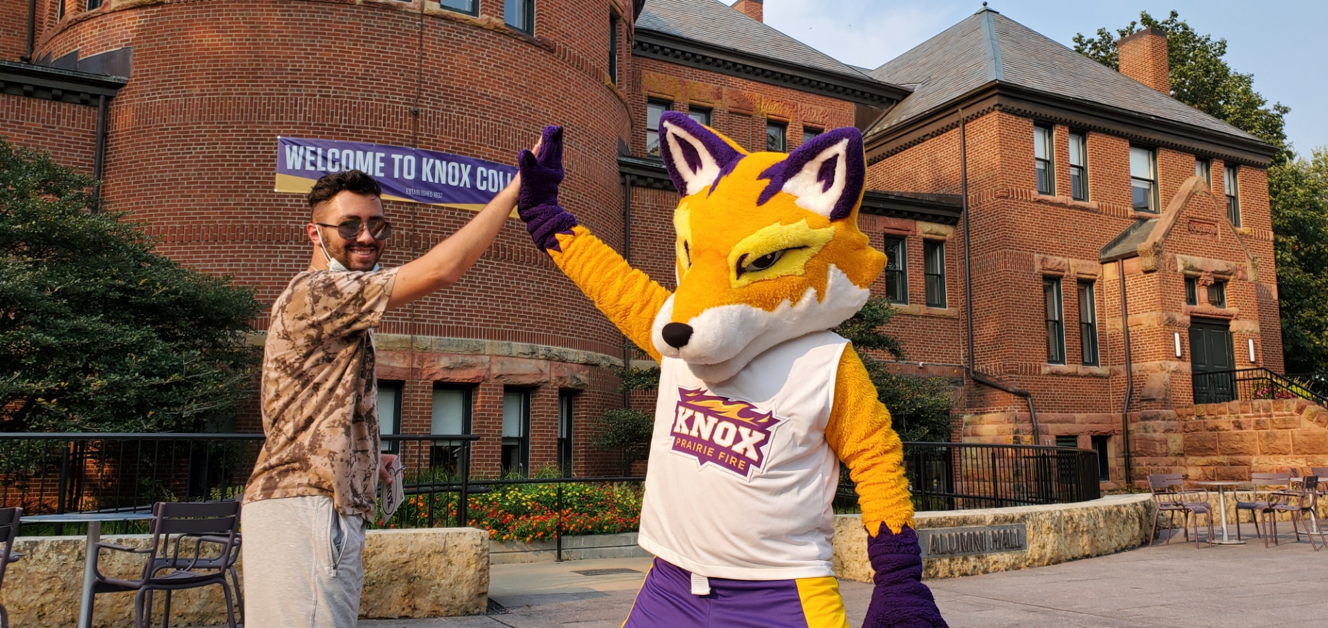 Chris Andreou ‘25 with Blaze the Fox. 