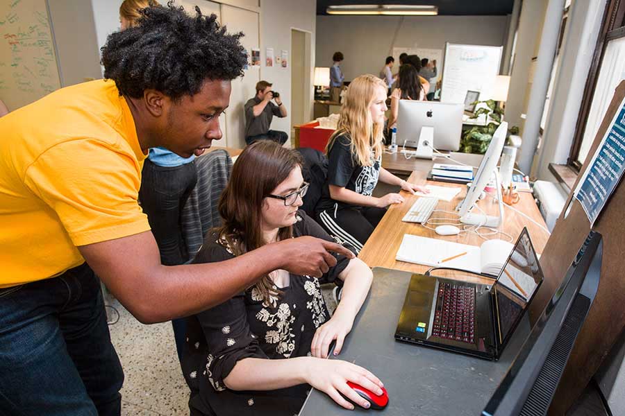 Students help each other with their projects during StartUp Term 2017