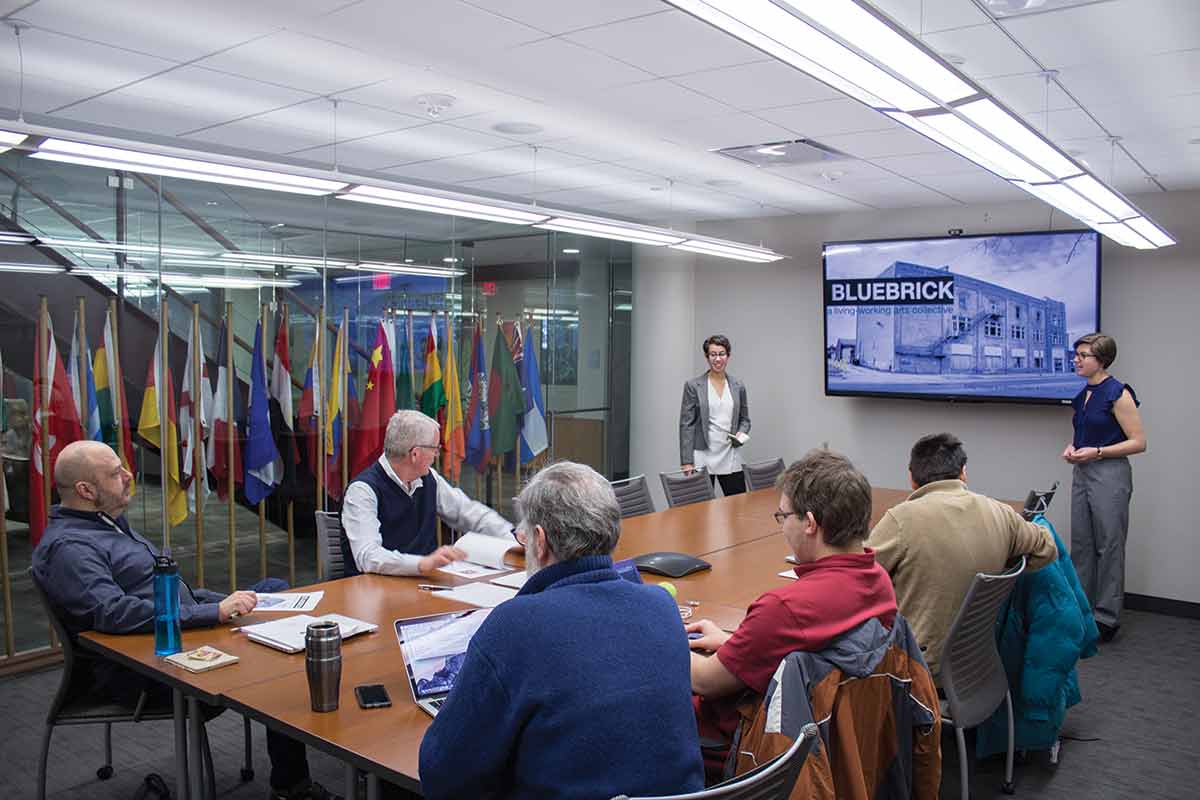 Bluebrick Collective, one of five teams participating in StartUp Term 2017, presents its business plan to professors John Spittell, Jaime Spacco, John Dooley, and Tim Stedman ’09.