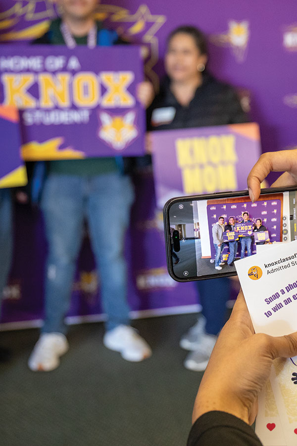 A family poses for a photo during an Admitted Student Day. 