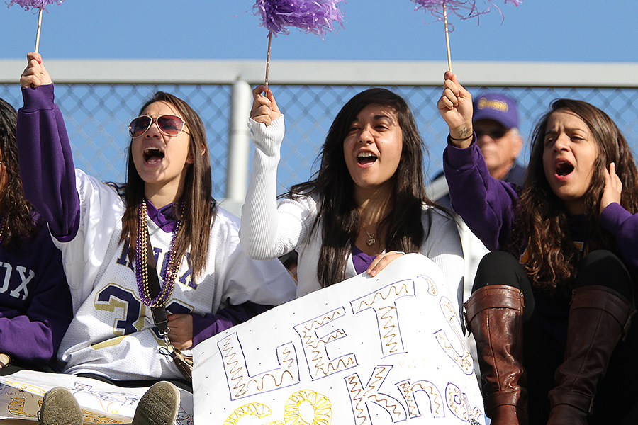 Cheering football on during the Homecoming 2012 football game. 