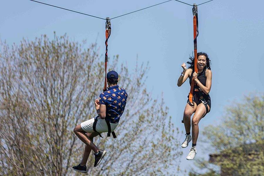 Student on the zipline on Flunk Day 2022