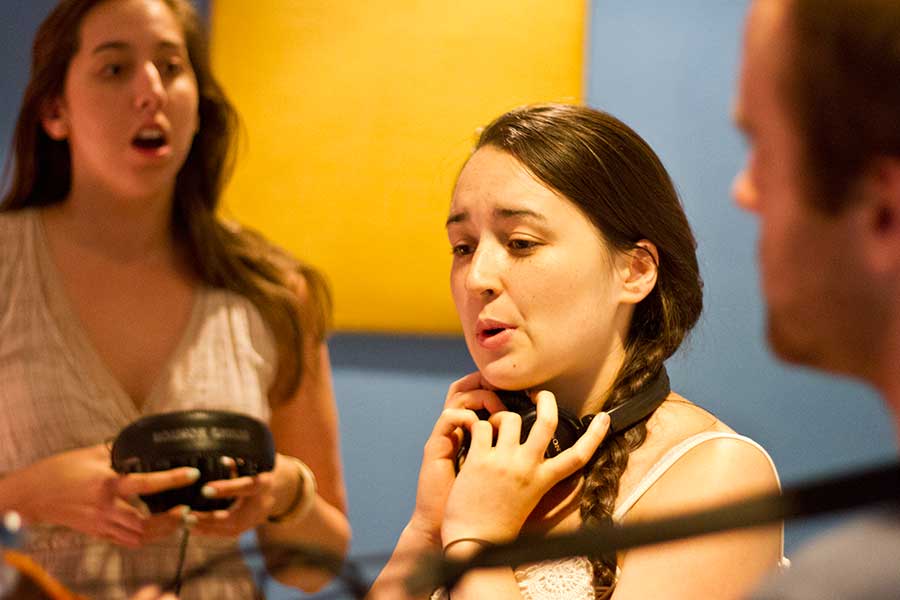 Annie Pittman '12, left, Jess Dearcangelis '11 and Sam Brownson '12, right