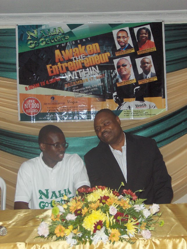 Oladipo Lawani (left) visits with Issac Durojaiye. Durojaiye was a speaker at the Awaken The Entrepreneur Within seminar organized by Lawani.