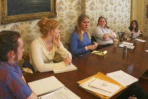 Knox student Rebecca Ganster, center, talks with other students