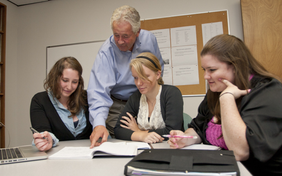 John Spittell with students who developed theme for 175th anniversary