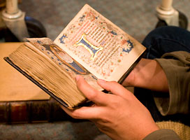 Student with medieval book