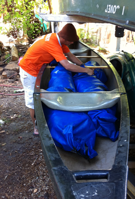 Jamie Jang packs a canoe