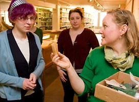 Students and professor at art history exhibit.