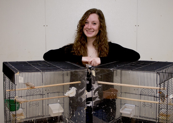 Kelly Wiggen with zebra finches