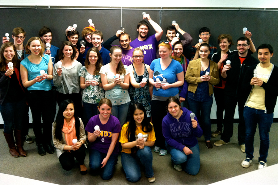 Knox College students promote enviromentally friendly LED light bulbs for a community action project for their Alternatives to Consumerism course. 