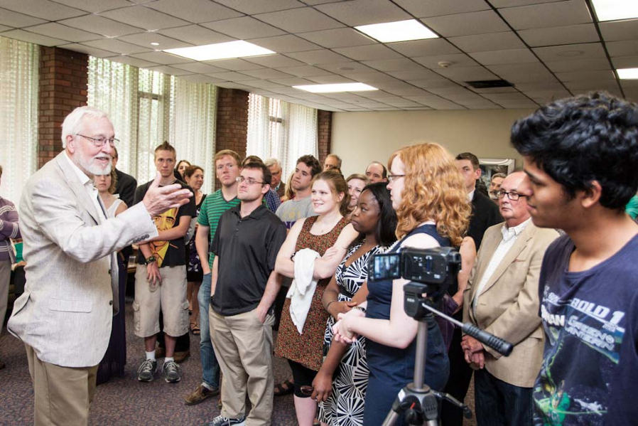 Professor Robert Seibert talks to students at his June 2013 retirement reception.