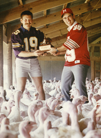 Knox Player Randy Oberembt and Monmouth Coach Kelly Kane with Bronze Turkey Trophy