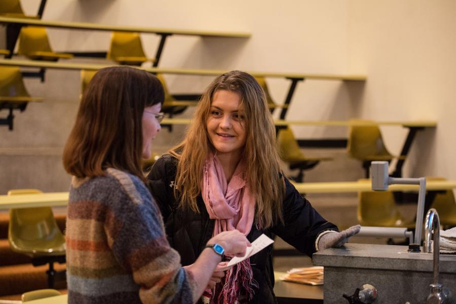 Biology professor Jennifer Templeton talks with a student at a review session the day before the Fall Term 2014 final exam.