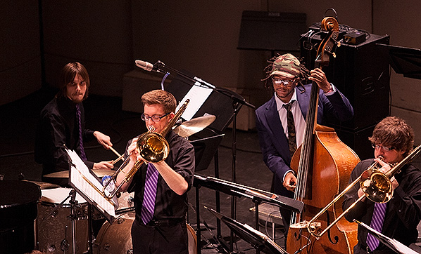 Bassist Ben Williams performs with the Knox College Jazz Ensemble, at the 2013 Knox-Rootabaga Jazz Festival.