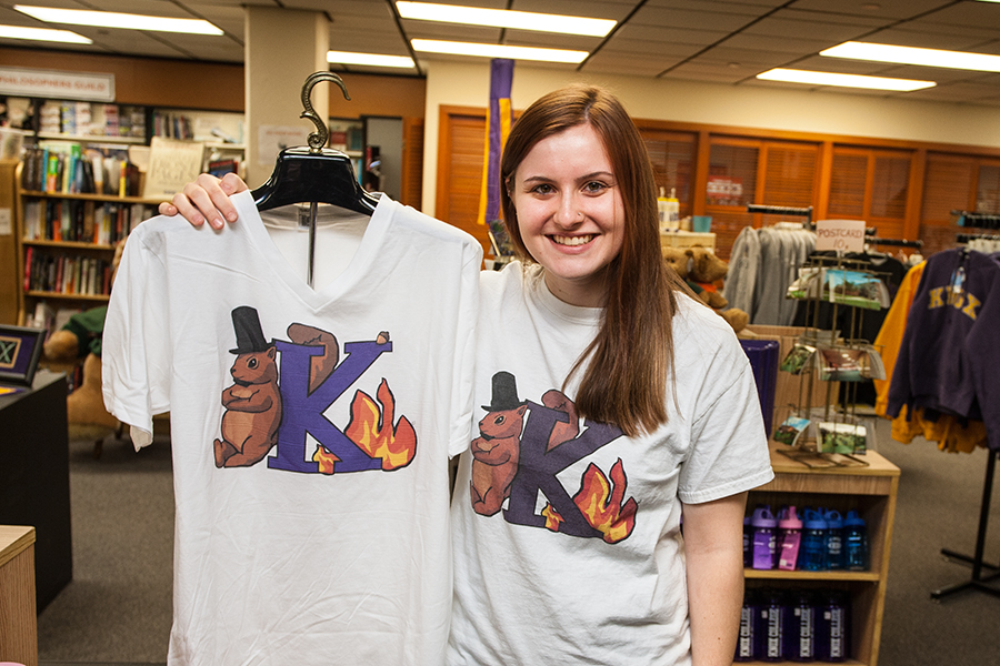 Knox student Rachel Janis with the Knox-inspired t-shirt she created that features a squirrel wearing Lincoln's iconic stovepipe hat. The t-shirt is on sale in the Knox College Bookstore.