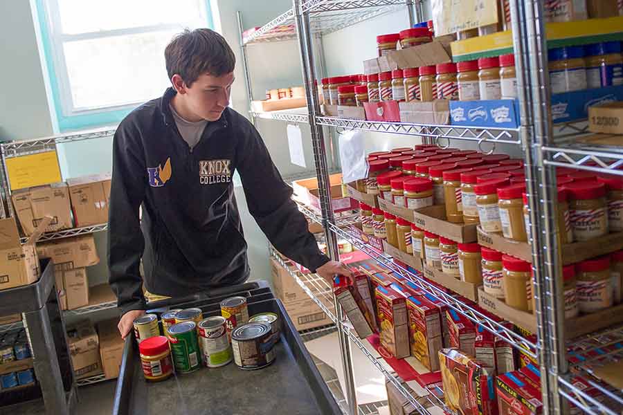 Andrew Jacobs, KnoxCorps associate, works at the FISH Food Pantry three days a week and helps with social media.