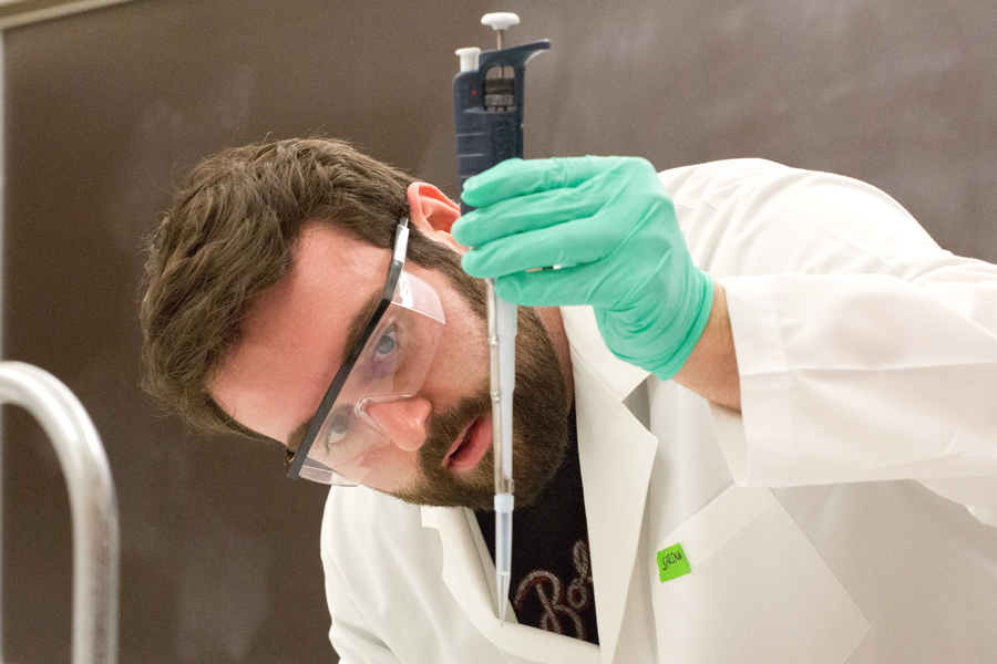 Knox College student in the lab section of a biochemistry class.