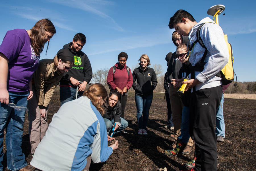 Knox College Environmental Studies class in Soil Science gathers data from burned and unburned sites at the Green Oaks Biological Field Station.