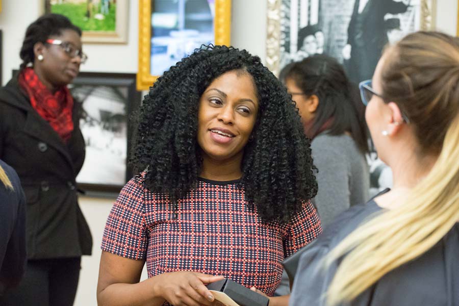 Entrepreneur Regine Rousseau '94 speaks with students at the Career Impact Summit