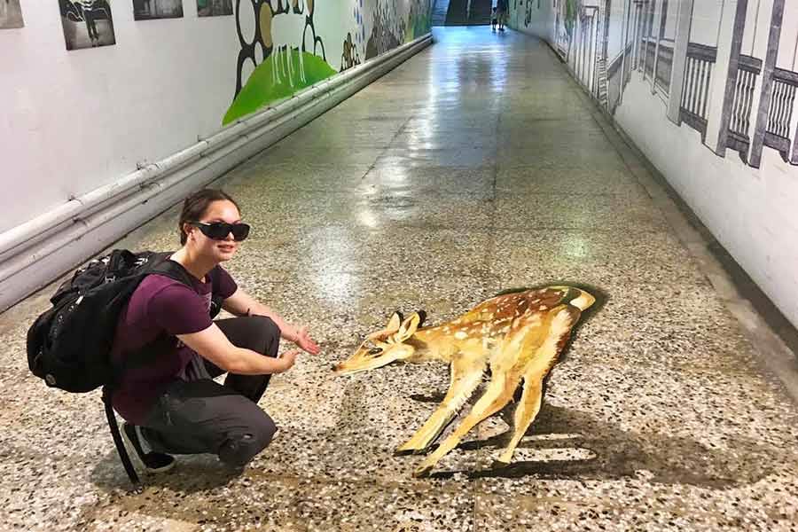 Eunice Shek '18 in an underground walkway that leads to a street full of shops and small eateries in Taiwan.