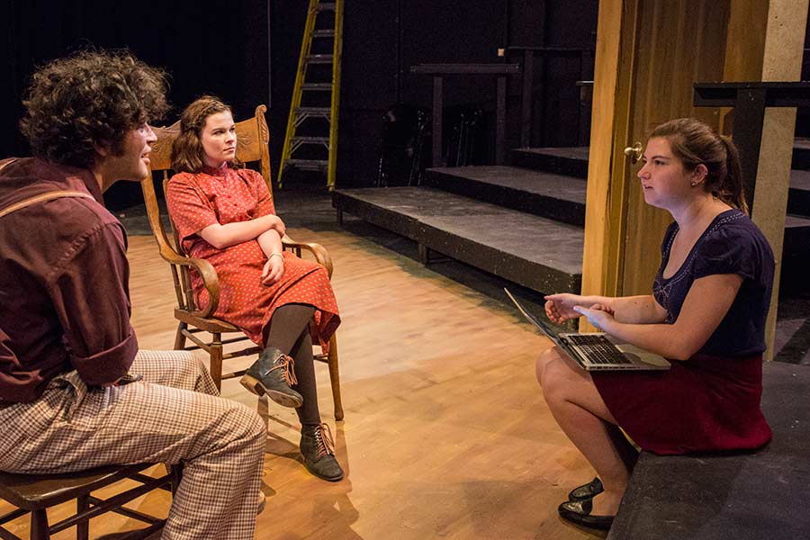 Director Emily Trevor '17 works with actors after a rehearsal.