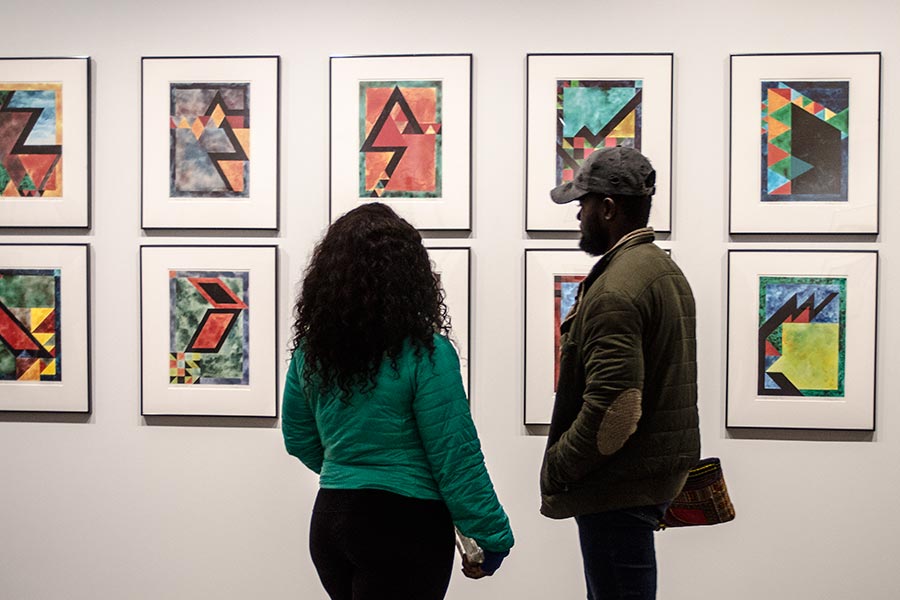 Alumni view the works of Keith Achepohl '56 at the newly opened Borzello Gallery on the Knox College campus.