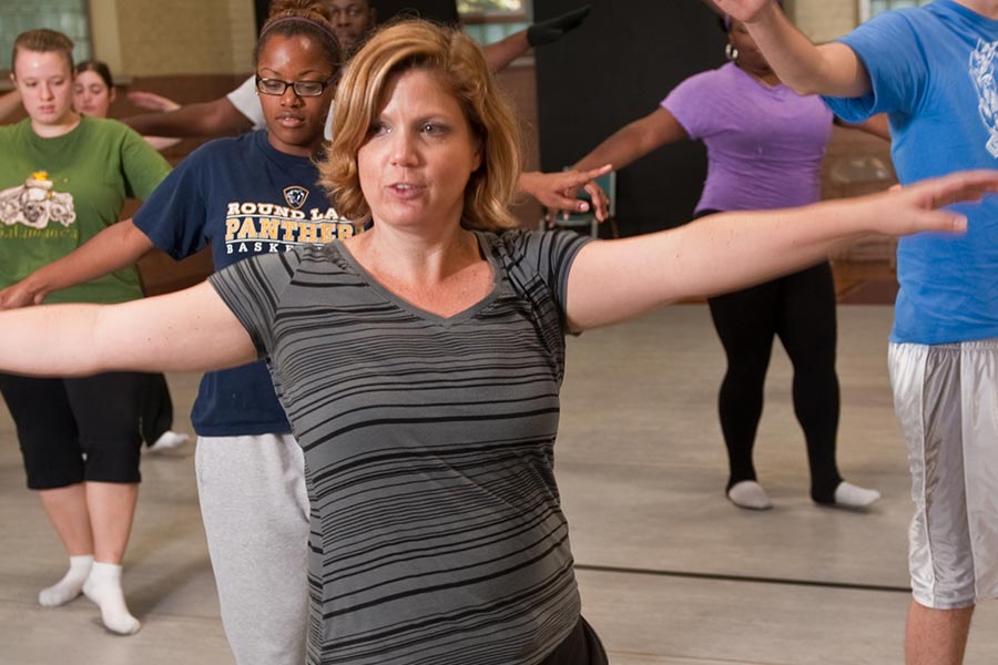 Students in Dance Class with faculty Jennifer Smith in Auxiliary Gym.