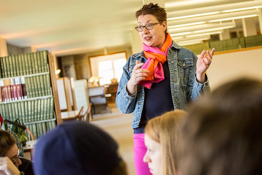 Professor Cate Denial in Seymour Library with history students