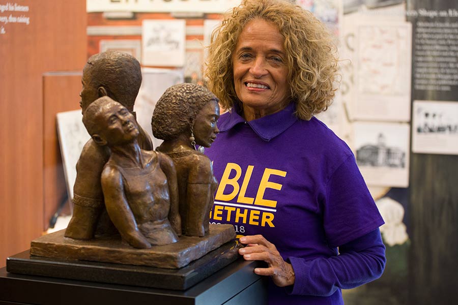 Fay Stevenson-Smith '64 and her sculpture at Knox College