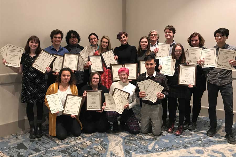 Staff of The Knox Student poses with ICPA awards