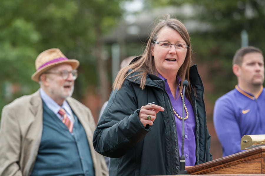 Knox Director of Athletics Daniella Irle speaks at the re-dedication of Jorge Prats Soccer Field