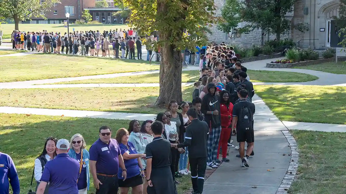 Knox students, faculty, and staff greet each other at the college's annual Pumphandle