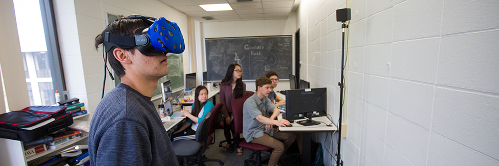 Professor John Dooley and student, in a computer science class.