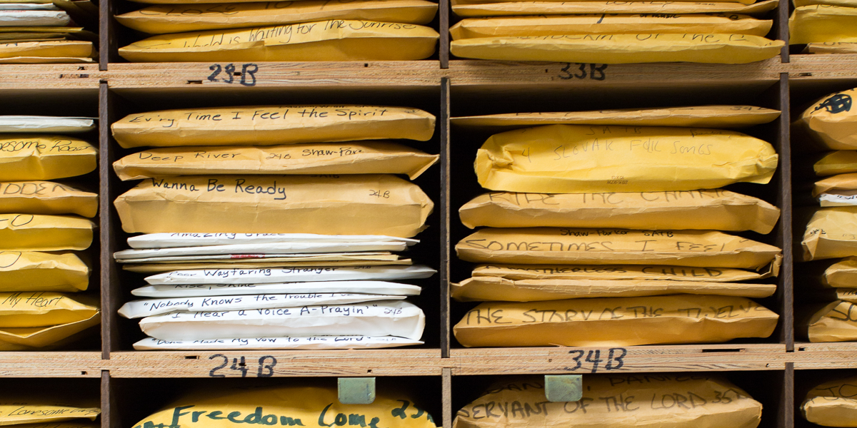 Envelopes filled with lyrics for the choir. 