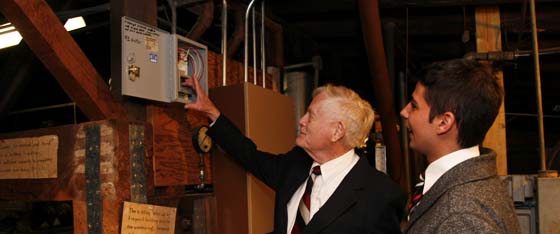 Robert Pennington '49 rings the Old Main bell.